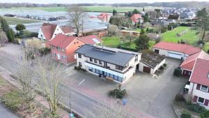 an aerial view of a small town with houses at MonteurGut Apartments Eiche in Lindern