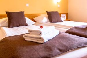 Postel nebo postele na pokoji v ubytování B&B Bau