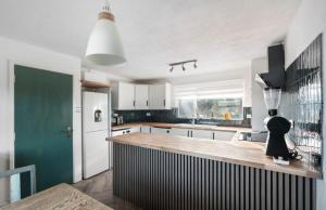 a kitchen with a counter with a blender on it at Henwick Loft in Henwick