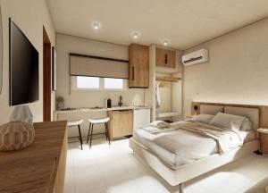 a bedroom with a white bed and a kitchen at Mandani Villa Luxury Apartments in Limenas