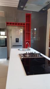 Kuchyň nebo kuchyňský kout v ubytování Ambré Guesthouse