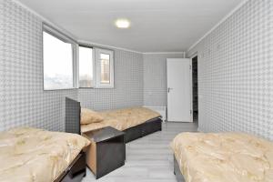 Voodi või voodid majutusasutuse Canyon Hostel City Center toas