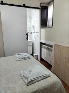 A bed or beds in a room at V.V Casa Mones