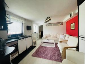 Kuchyňa alebo kuchynka v ubytovaní Apartmany pod Troma Korunami