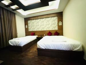 Letto o letti in una camera di Lazimpat Boutique Hotel