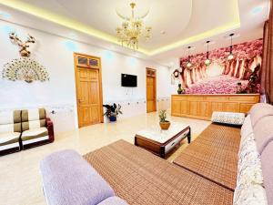 TV a/nebo společenská místnost v ubytování Hoa Chuông Villa Đà Lạt