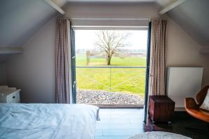Postel nebo postele na pokoji v ubytování B&B Anna-Grace