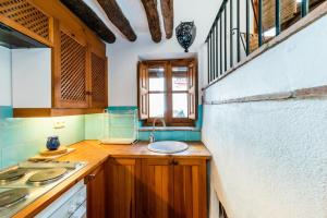 Kuchyň nebo kuchyňský kout v ubytování Casa Buena Vista near Granada