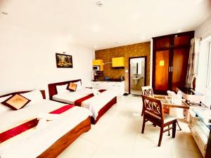 Postel nebo postele na pokoji v ubytování Đức Anh HoTel Vũng Tàu