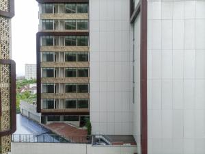 a view from the balcony of a building at Elegant and Comfortable Studio Patraland Amarta Apartment By Travelio in Beran-kidul