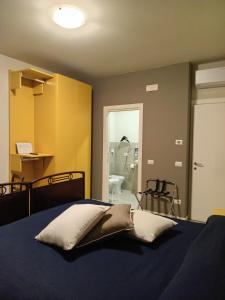Postel nebo postele na pokoji v ubytování Il Trovatore Rooms