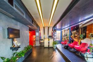 TV a/nebo společenská místnost v ubytování Do Stil Boutique Hotel