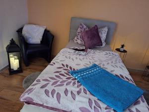 Ένα ή περισσότερα κρεβάτια σε δωμάτιο στο Ferienapartment Obertshauser
