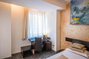 Postel nebo postele na pokoji v ubytování Do Stil Boutique Hotel