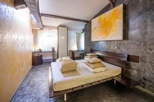 Postel nebo postele na pokoji v ubytování Do Stil Boutique Hotel