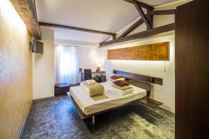 Postel nebo postele na pokoji v ubytování Do Stil Boutique Hotel