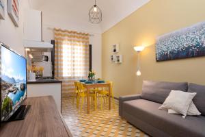 Et tv og/eller underholdning på I Tre Golfi - Appartamenti a 300 mt dal mare