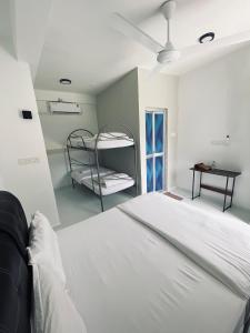 Postel nebo postele na pokoji v ubytování CasaView Beach