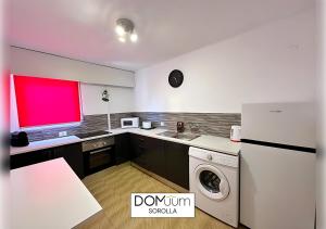 A kitchen or kitchenette at DOMuum Holidays - SOROLLA