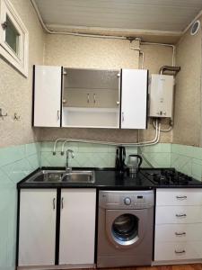 Kuchyň nebo kuchyňský kout v ubytování Apartment in Amiryan