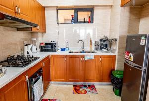 Kuchyň nebo kuchyňský kout v ubytování Serene 2-Bedroom Retreat