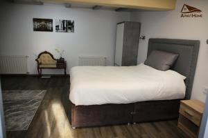 Postel nebo postele na pokoji v ubytování ApartHome