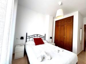 Posteľ alebo postele v izbe v ubytovaní Mirador de Doñana Nº8, Apartamentos Living Sur