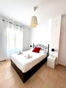 Posteľ alebo postele v izbe v ubytovaní Mirador de Doñana Nº8, Apartamentos Living Sur
