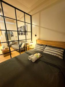 Katil atau katil-katil dalam bilik di Mayumi Staycation on SMDC Trees Residences +13 gambar