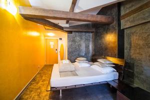 Postel nebo postele na pokoji v ubytování Do Stil Boutique Hotel