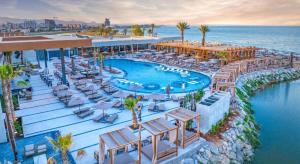 an aerial view of a resort with a swimming pool at Grand sapphire resort Ötüken yeni iskele North Cyprus in Trikomo