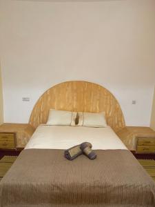 Postel nebo postele na pokoji v ubytování Hôtel Khalwa