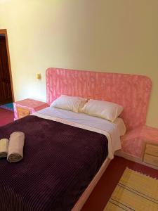 Postel nebo postele na pokoji v ubytování Hôtel Khalwa