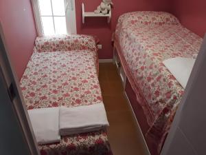 1 Linea Playa , 3 Dorm Islantilla客房内的一张或多张床位
