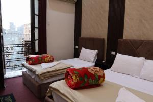 Voodi või voodid majutusasutuse Meramees Hotel toas