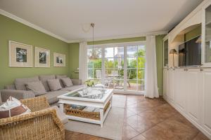 Televiisor ja/või meelelahutuskeskus majutusasutuses Müggenburger Weg 38 Haus Küselwind