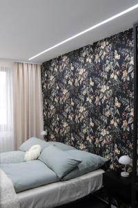 Ένα ή περισσότερα κρεβάτια σε δωμάτιο στο Elvora Apartments