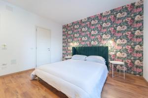 Voodi või voodid majutusasutuse Zuli's Rooms toas