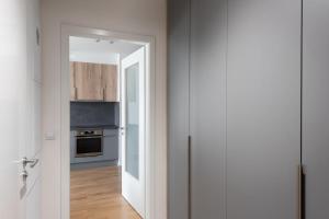 Kuchyň nebo kuchyňský kout v ubytování Fresh All-in Apartment Prague