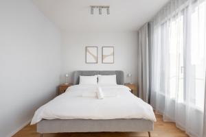 Postel nebo postele na pokoji v ubytování Fresh All-in Apartment Prague