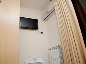 TV a/nebo společenská místnost v ubytování B&B Dimore Sonore Gallipoli