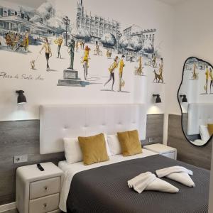 Postel nebo postele na pokoji v ubytování Hostal Lauria