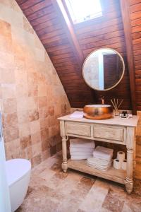 a bathroom with a sink and a mirror at Exclusive Hill Sapanca in Sapanca