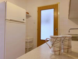 Kuchyň nebo kuchyňský kout v ubytování Apartments Volaric