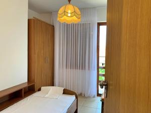 Postel nebo postele na pokoji v ubytování Apartments Volaric