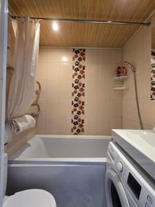 Koupelna v ubytování Hero Avenue Apartment + 30 fotografií