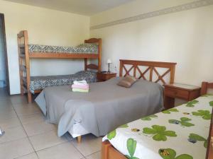 Postel nebo postele na pokoji v ubytování Aparthotel Agave