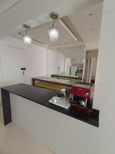 Η κουζίνα ή μικρή κουζίνα στο Praia da Guilhermina-PG