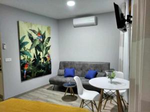 Posedenie v ubytovaní Apartamentos Harmonia