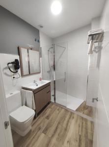 Kúpeľňa v ubytovaní Apartamentos Harmonia